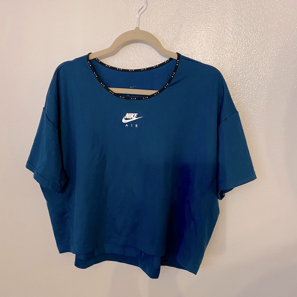 Dark teal/blue crop mesh top